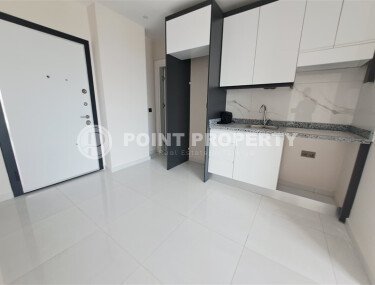 Новая 1+1, 44 м² в районе Авсаллар в крупном комплексе — дом 2024 года-id-10465-фото-1