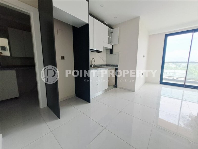 Новая 1+1, 44 м² в районе Авсаллар в крупном комплексе — дом 2024 года-id-10465-фото-2