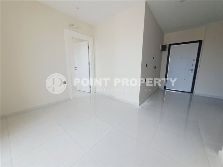 Новая 1+1, 44 м² в районе Авсаллар в крупном комплексе — дом 2024 года-id-10465-фото-4