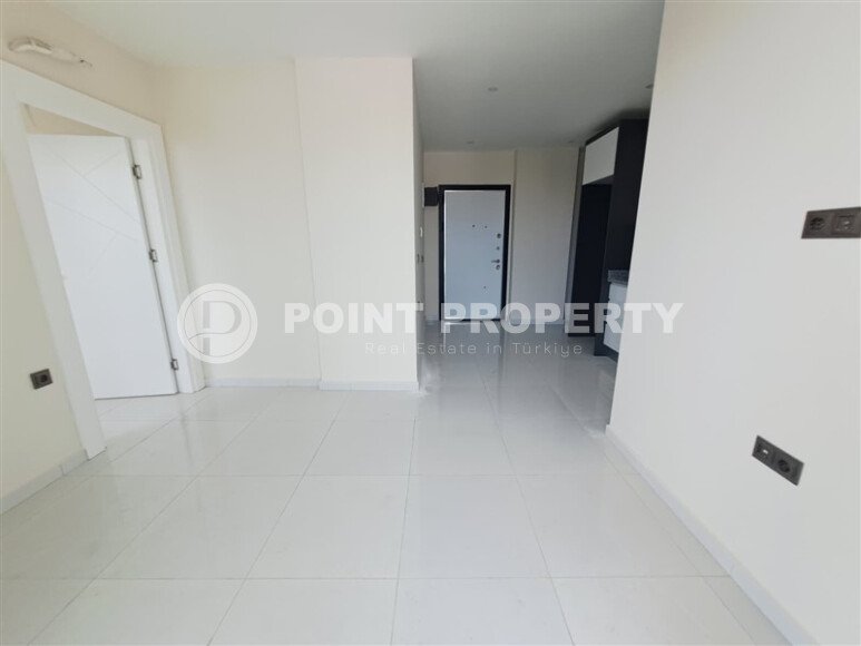 Новая 1+1, 44 м² в районе Авсаллар в крупном комплексе — дом 2024 года-id-10465-фото-5