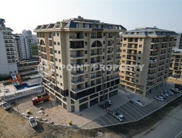 Элитные квартиры в комплексе с отличной локацией, центр района Махмутлар. До моря 700 метров.-id-1068-фото-1