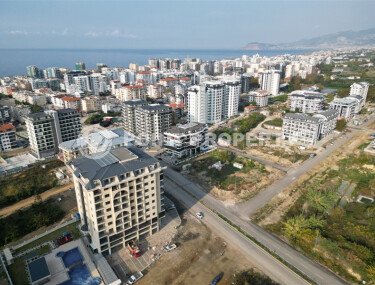 Элитные квартиры в комплексе с отличной локацией, центр района Махмутлар. До моря 700 метров.-id-1068-фото-2