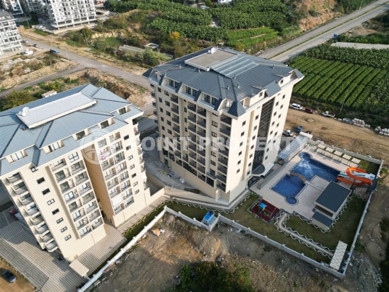 Элитные квартиры в комплексе с отличной локацией, центр района Махмутлар. До моря 700 метров.-id-1068-фото-3