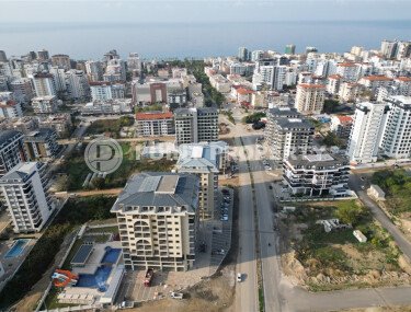 Элитные квартиры в комплексе с отличной локацией, центр района Махмутлар. До моря 700 метров.-id-1068-фото-5