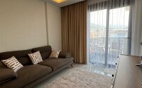 Новая 1+1 в центральной части Алании — 56 м², дом 2023 года-id-10469-фото-7