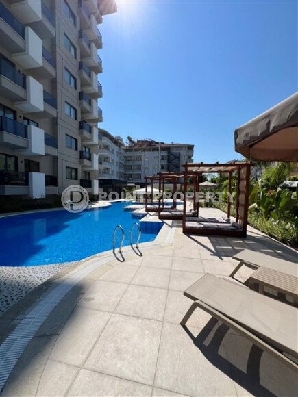 Новая 1+1 в центральной части Алании — 56 м², дом 2023 года-id-10469-фото-14