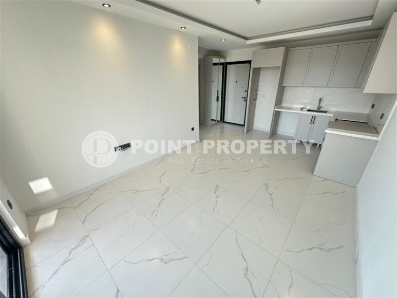 Квартира 1+1 в Кестеле в новом комплексе на первой линии моря-id-10472-photo-1