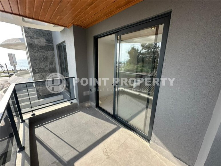 Квартира 1+1 в Кестеле в новом комплексе на первой линии моря-id-10472-photo-26