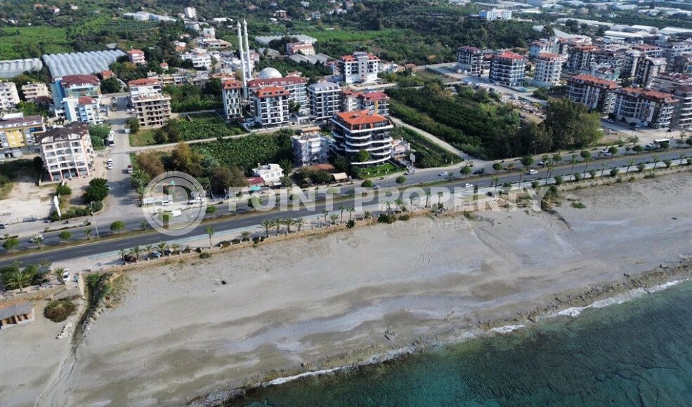 Квартира 1+1 в Кестеле в новом комплексе на первой линии моря-id-10472-photo-35