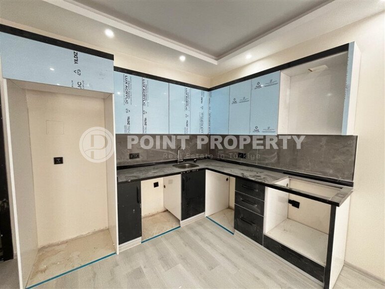 Новая 1+1 в районе Оба — 52 м², дом 2025 года-id-10473-фото-1
