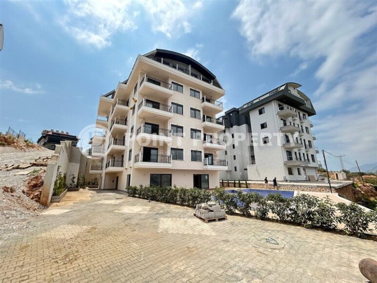 Новая 1+1 в районе Оба — 52 м², дом 2025 года-id-10473-фото-19