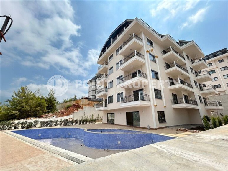 Новая 1+1 в районе Оба — 52 м², дом 2025 года-id-10473-фото-20