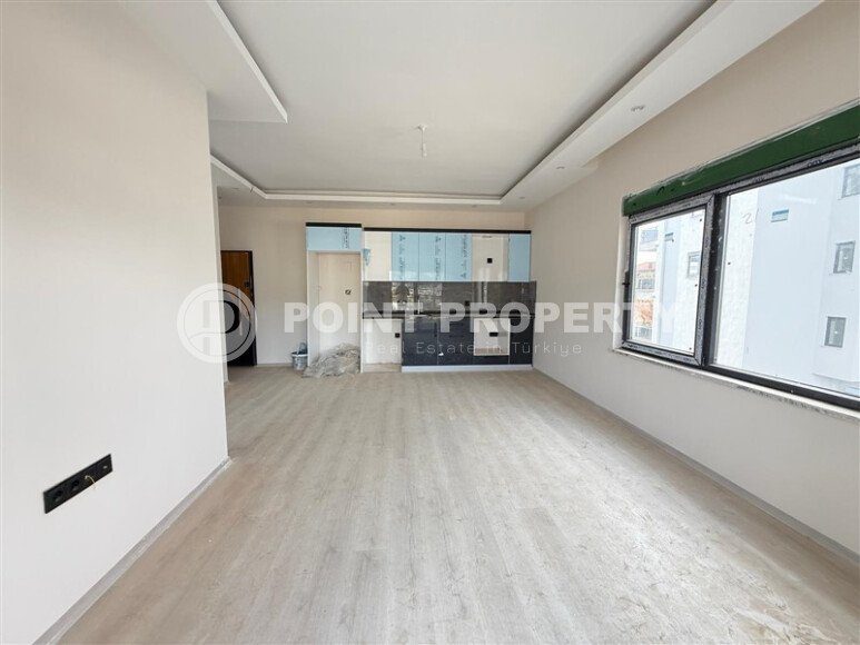 Современная 1+1 в районе Оба с видом на горы — новостройка 2025 года-id-10474-фото-2