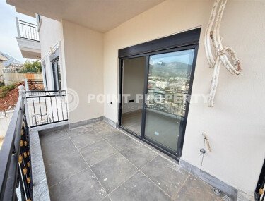 Современная 1+1 в районе Оба с видом на горы — новостройка 2025 года-id-10474-фото-3