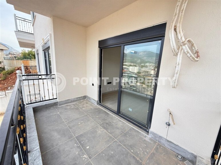 Современная 1+1 в районе Оба с видом на горы — новостройка 2025 года-id-10474-фото-3