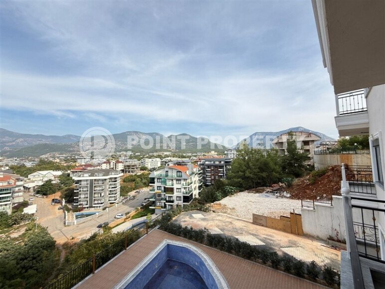 Современная 1+1 в районе Оба с видом на горы — новостройка 2025 года-id-10474-фото-5