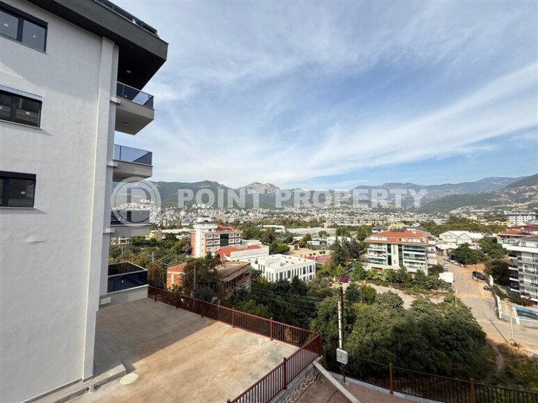 Современная 1+1 в районе Оба с видом на горы — новостройка 2025 года-id-10474-фото-7