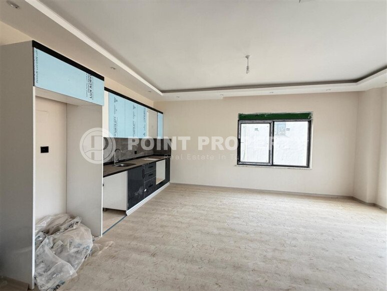 Современная 1+1 в районе Оба с видом на горы — новостройка 2025 года-id-10474-фото-9