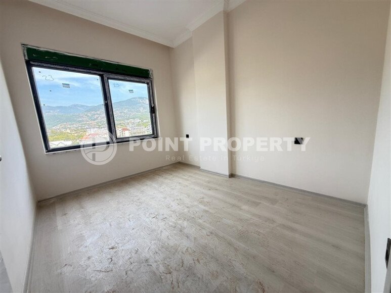 Современная 1+1 в районе Оба с видом на горы — новостройка 2025 года-id-10474-фото-10