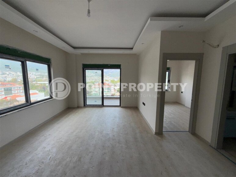 Современная 1+1 в районе Оба с видом на горы — новостройка 2025 года-id-10474-фото-13