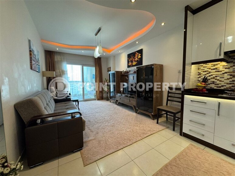 Светлая 1+1 55 m² в Махмутларе в комплексе с аквапарком и богатой инфраструктурой-id-10480-photo-3