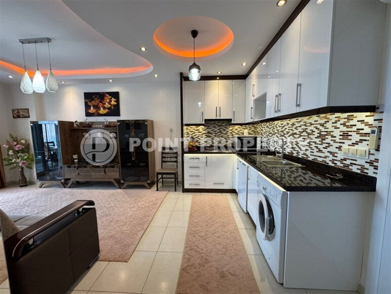 Светлая 1+1 55 m² в Махмутларе в комплексе с аквапарком и богатой инфраструктурой-id-10480-photo-7