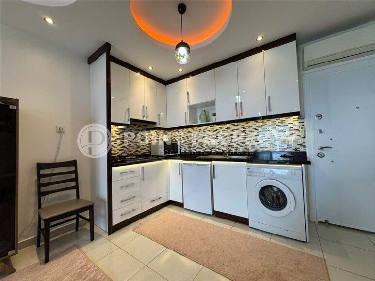 Светлая 1+1 55 m² в Махмутларе в комплексе с аквапарком и богатой инфраструктурой-id-10480-photo-9