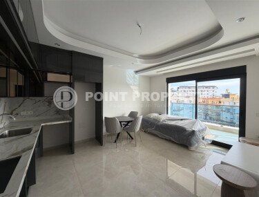 New apartment with fine finishing 800 meters from the sea, in the center of Alanya-id-7542-photo-2