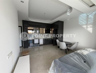 New apartment with fine finishing 800 meters from the sea, in the center of Alanya-id-7542-photo-3