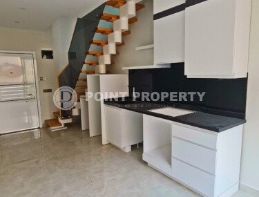 Duplex apartment 55 m² on the first line in Mahmutlar-id-10484-photo-2