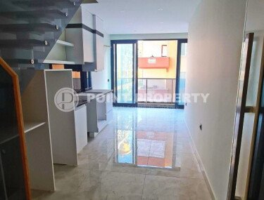 Duplex apartment 55 m² on the first line in Mahmutlar-id-10484-photo-3