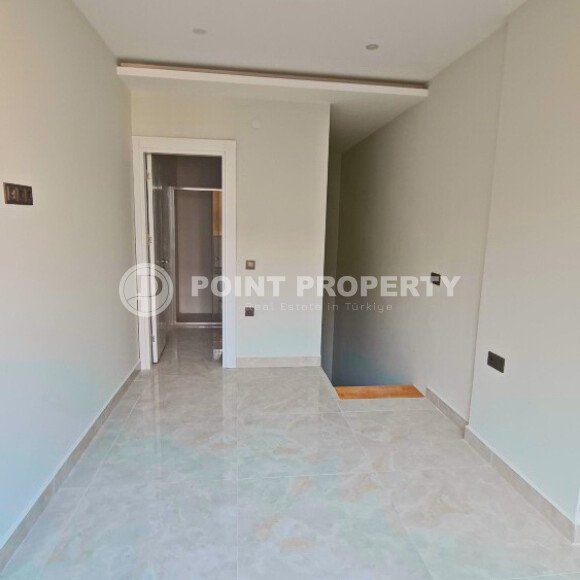 Двухуровневая квартира 55 м² на первой линии в Махмутларе-id-10484-фото-4