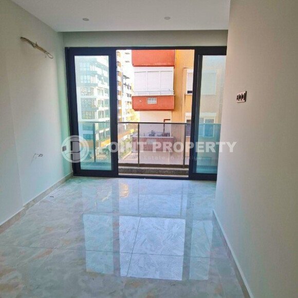 Двухуровневая квартира 55 м² на первой линии в Махмутларе-id-10484-фото-5