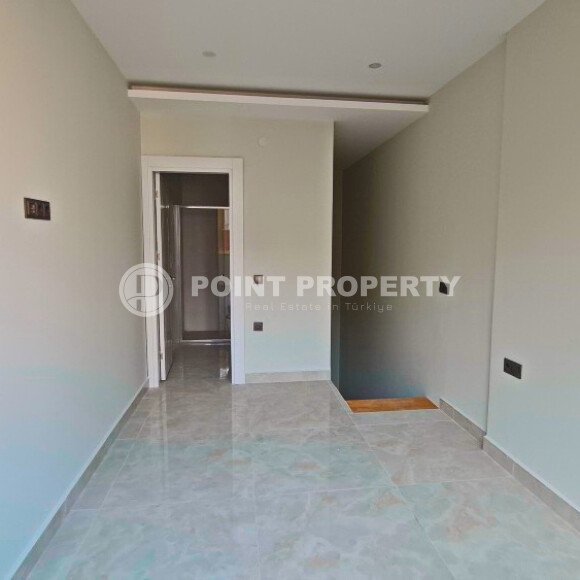 Двухуровневая квартира 55 м² на первой линии в Махмутларе-id-10484-фото-6