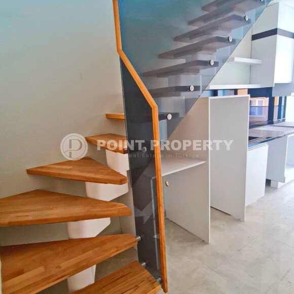 Двухуровневая квартира 55 м² на первой линии в Махмутларе-id-10484-фото-7