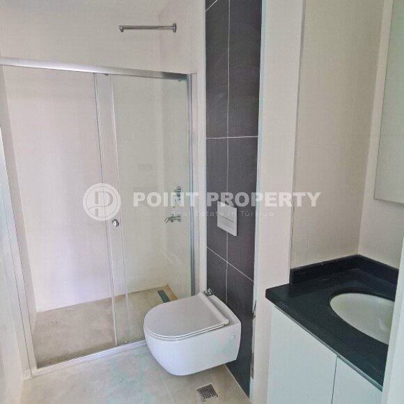 Двухуровневая квартира 55 м² на первой линии в Махмутларе-id-10484-фото-8