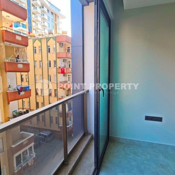 Двухуровневая квартира 55 м² на первой линии в Махмутларе-id-10484-фото-9