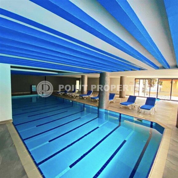 Двухуровневая квартира 55 м² на первой линии в Махмутларе-id-10484-фото-10