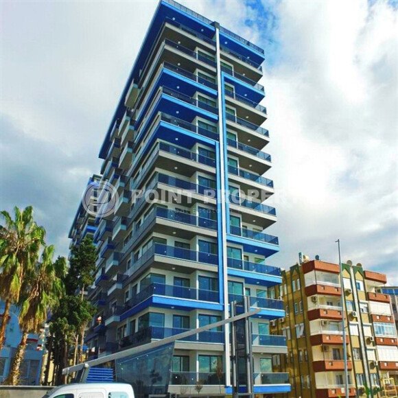 Двухуровневая квартира 55 м² на первой линии в Махмутларе-id-10484-фото-16