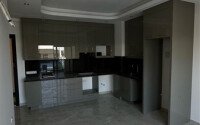 Современная квартира 58 м² в районе Махмутлар по выгодной цене-id-10489-фото-7