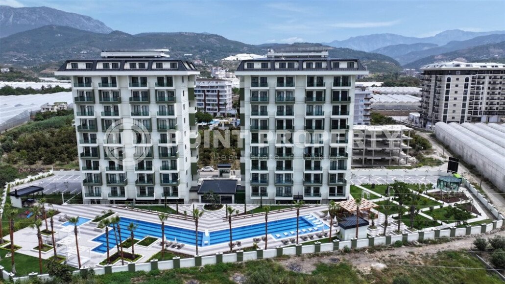 Новая квартира 55 м² в престижном комплексе района Демирташ-id-10491-фото-1