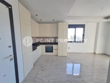 Новая квартира 55 м² в престижном комплексе района Демирташ-id-10491-фото-2