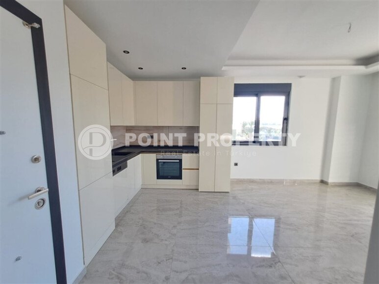 Новая квартира 55 м² в престижном комплексе района Демирташ-id-10491-фото-2