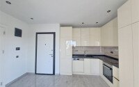 Новая квартира 55 м² в престижном комплексе района Демирташ-id-10491-фото-3