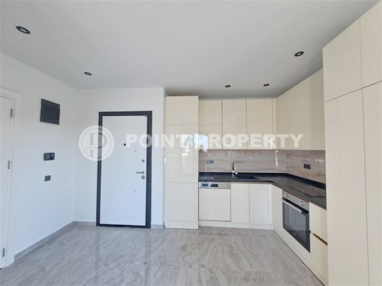 Новая квартира 55 м² в престижном комплексе района Демирташ-id-10491-фото-3