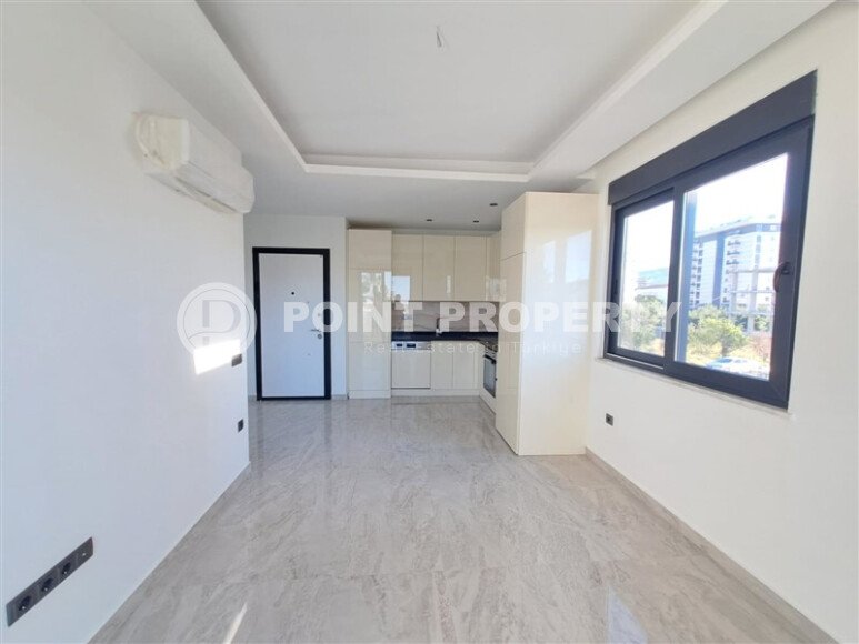 Новая квартира 55 м² в престижном комплексе района Демирташ-id-10491-фото-5