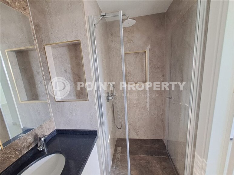 Новая квартира 55 м² в престижном комплексе района Демирташ-id-10491-фото-8