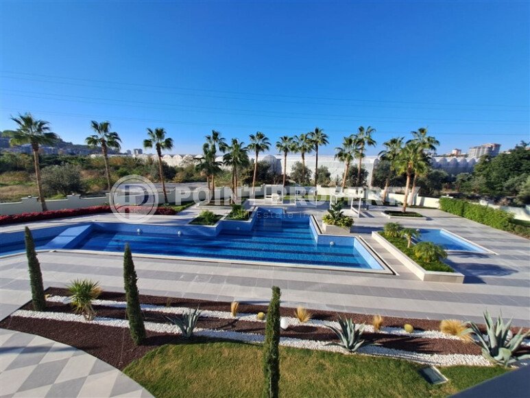 Новая квартира 55 м² в престижном комплексе района Демирташ-id-10491-фото-11