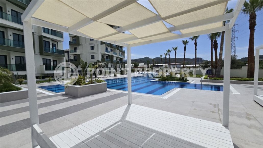 Новая квартира 55 м² в престижном комплексе района Демирташ-id-10491-фото-16