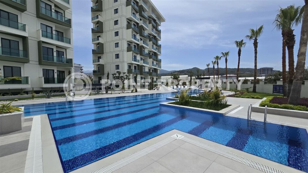 Новая квартира 55 м² в престижном комплексе района Демирташ-id-10491-фото-20